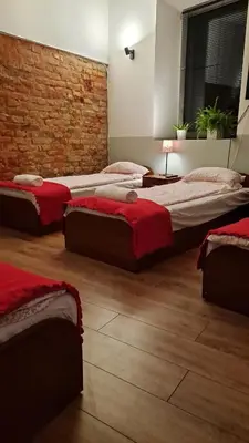 Łóżko lub łóżka w pokoju w obiekcie Noclegi Czentorycki 1