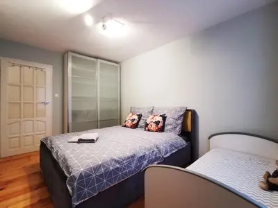 Łóżko lub łóżka w pokoju w obiekcie NOŻOWNICZA Apartment ~ Self Check-In 24h ~ Lift