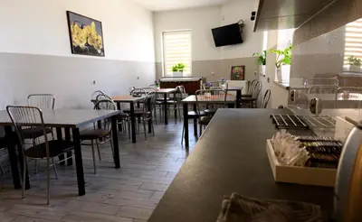Restauracja lub miejsce do jedzenia w obiekcie Noclegi GALESZ