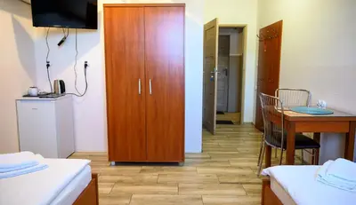 Łóżko lub łóżka w pokoju w obiekcie Noclegi GALESZ