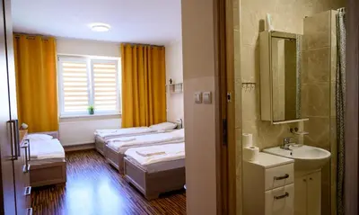 Łóżko lub łóżka w pokoju w obiekcie Noclegi GALESZ