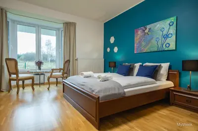 Łóżko lub łóżka w pokoju w obiekcie Dom Na Polanie, MyWeek