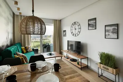 Telewizja i/lub zestaw kina domowego w obiekcie Apartament Bliżej Natury 2