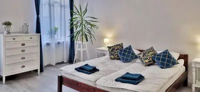 Łóżko lub łóżka w pokoju w obiekcie Apartament Kaczyniec 10