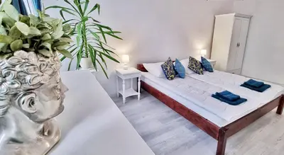 Łóżko lub łóżka w pokoju w obiekcie Apartament Kaczyniec 10