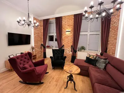 Telewizja i/lub zestaw kina domowego w obiekcie Brick Castle - Apartament Helga