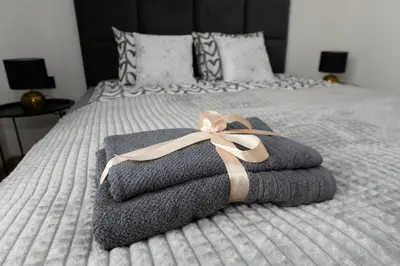 Łóżko lub łóżka w pokoju w obiekcie Apartamenty RIO Skarbimierz-Osiedle