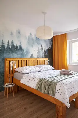 Łóżko lub łóżka w pokoju w obiekcie LAS I GÓRY Jedlina-Zdrój. Apartament na 5