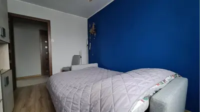 Łóżko lub łóżka w pokoju w obiekcie Spokojny Wypoczynek 4