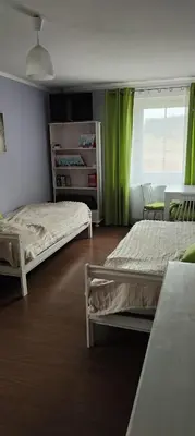 Łóżko lub łóżka w pokoju w obiekcie Agroturystyka Przystanek Góry Sowie