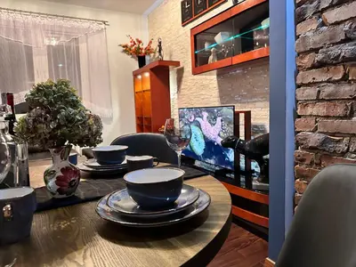 Telewizja i/lub zestaw kina domowego w obiekcie Be Inn - Luxury Apartment Gliwice