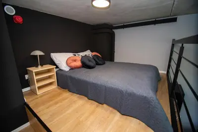 Łóżko lub łóżka w pokoju w obiekcie Studia przy lotnisku od WroclawApartament-pl