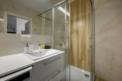 Łazienka w obiekcie Apartament SUNRISE Kudowa z balkonem