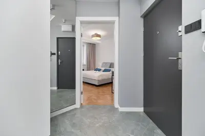 Łóżko lub łóżka w pokoju w obiekcie Apartment in The Heart of Wrocław by Renters Prestige