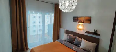 Łóżko lub łóżka w pokoju w obiekcie Zebra