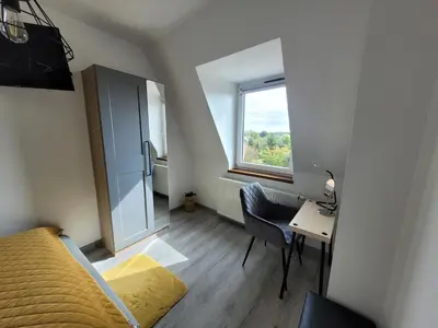 Łóżko lub łóżka w pokoju w obiekcie Apartament Radiostacja, parking free, klimatyzacja