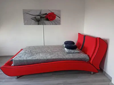 Łóżko lub łóżka w pokoju w obiekcie Apartament Radiostacja, parking free, klimatyzacja