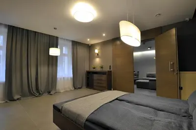 Łóżko lub łóżka w pokoju w obiekcie Apartament PLATYNOWY - Centrum Gliwic z parkingiem