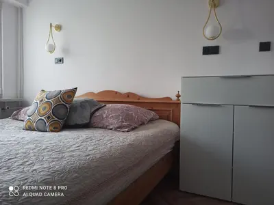 Łóżko lub łóżka w pokoju w obiekcie Mieszkanie Antoni