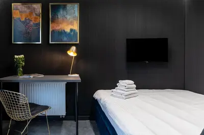 Łóżko lub łóżka w pokoju w obiekcie Apartament NEGRO Gliwice - nowe osiedle, klimatyzacja, parking