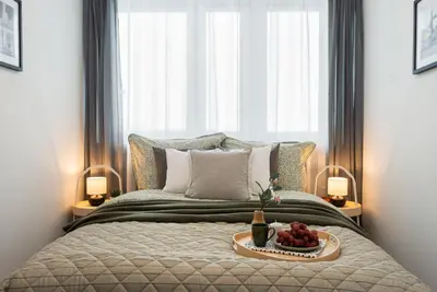 Łóżko lub łóżka w pokoju w obiekcie Kairos Apartments - Silver - darmowy Parking, ścisłe centrum