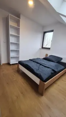 Łóżko lub łóżka w pokoju w obiekcie Dom pod Wroclawiem23