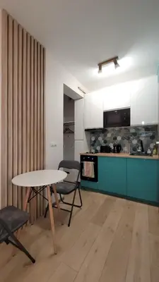Kuchnia lub aneks kuchenny w obiekcie Green Terrace Family Apartment
