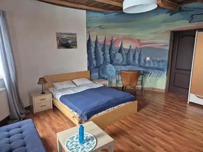 Łóżko lub łóżka w pokoju w obiekcie ORLIK House