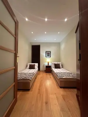 Łóżko lub łóżka w pokoju w obiekcie Apartament Josefina