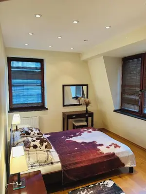 Łóżko lub łóżka w pokoju w obiekcie Apartament Josefina