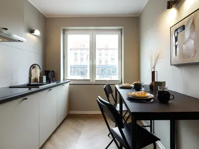 Kuchnia lub aneks kuchenny w obiekcie Apartament Good Morning Wrocław - 100m Rynek - Netflix - Free Parking - 3 separate rooms - AC