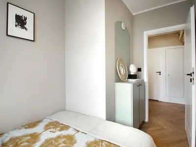 Łóżko lub łóżka w pokoju w obiekcie Apartament Good Morning Wrocław - 100m Rynek - Netflix - Free Parking - 3 separate rooms - AC
