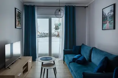Część wypoczynkowa w obiekcie Apartament Słoneczny z tarasem i ogrodem