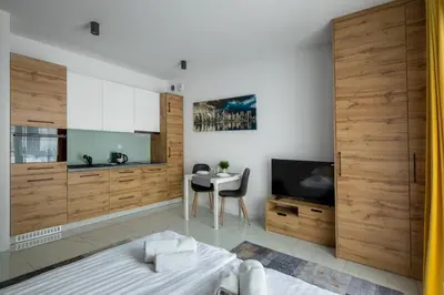 Telewizja i/lub zestaw kina domowego w obiekcie Apartament Ażurowy