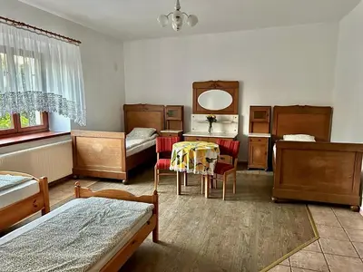 Łóżko lub łóżka w pokoju w obiekcie Dom Kawalera Ściborzyce Małe 35