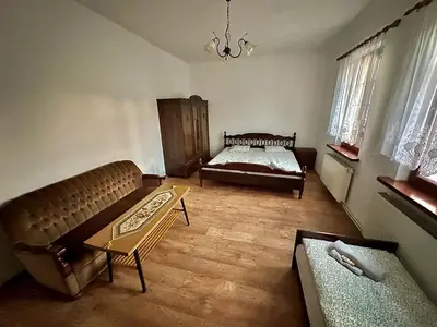 Łóżko lub łóżka w pokoju w obiekcie Dom Kawalera Ściborzyce Małe 35
