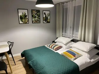 Łóżko lub łóżka w pokoju w obiekcie Apartamenty Błogi Sen II- komfortowy nocleg w spokojnej lokalizacji