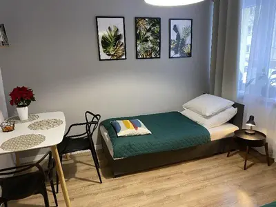 Łóżko lub łóżka w pokoju w obiekcie Apartamenty Błogi Sen II- komfortowy nocleg w spokojnej lokalizacji