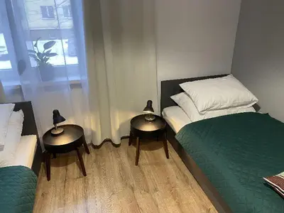 Łóżko lub łóżka w pokoju w obiekcie Apartamenty Błogi Sen II- komfortowy nocleg w spokojnej lokalizacji