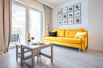 Część wypoczynkowa w obiekcie Apartament z kominkiem.. and SPA, MyWeek