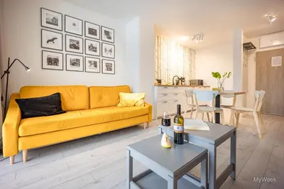 Część wypoczynkowa w obiekcie Apartament z kominkiem.. and SPA, MyWeek