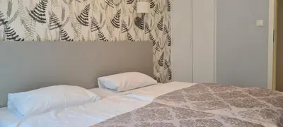 Łóżko lub łóżka w pokoju w obiekcie Apartamenty Czarna Góra L16