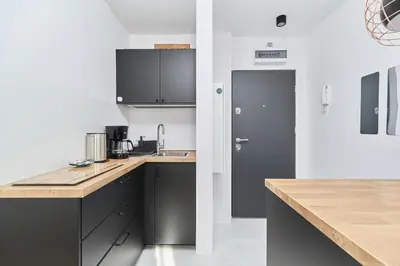 Kuchnia lub aneks kuchenny w obiekcie City Center Studio Apartment Wrocław by Noclegi Renters