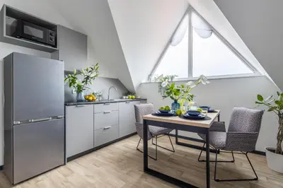 Kuchnia lub aneks kuchenny w obiekcie Aparthotel Solskiego Wrocław