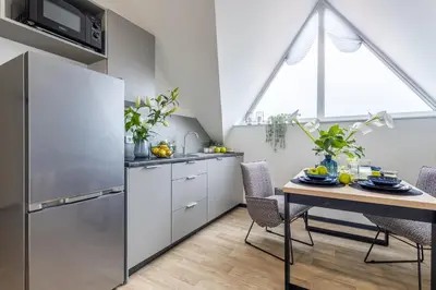 Kuchnia lub aneks kuchenny w obiekcie Aparthotel Solskiego Wrocław