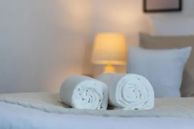 Łóżko lub łóżka w pokoju w obiekcie Aparthotel Solskiego Wrocław