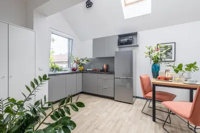 Kuchnia lub aneks kuchenny w obiekcie Aparthotel Solskiego Wrocław
