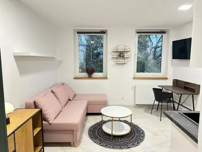 Telewizja i/lub zestaw kina domowego w obiekcie MOVEEN! Apartamenty Wrocław Nowoczesne studia z parkingiem! 10 min od centrum