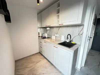 Kuchnia lub aneks kuchenny w obiekcie MOVEEN! Apartamenty Wrocław Nowoczesne studia z parkingiem! 10 min od centrum