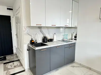 Kuchnia lub aneks kuchenny w obiekcie MOVEEN! Apartamenty Wrocław Nowoczesne studia z parkingiem! 10 min od centrum